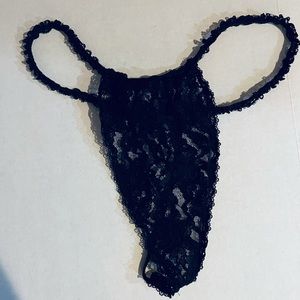 Black thong XL but runs small - more like a medium. NWOT.